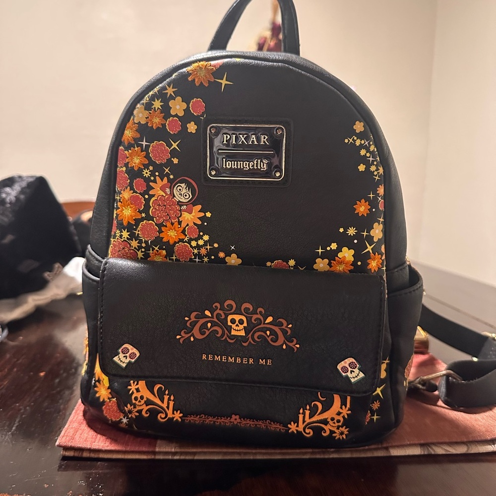 Loungefly Black Backpack with Orange and Yellow Floral Accents